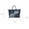 Grande capacidade denim tote outono casual estilo punk lona carta artesanal borla bolsa de maquiagem saco de compras colorido 240305