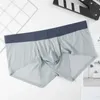 Cuecas masculinas juventude gelo seda sem costura boxer shorts ultra-fino respirável secagem rápida solto menino sexy u bolsa convexa