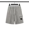 Designer skjortor herrar t short shorts brev tryckt tshirt sommar strand shorts bomull t skjortor avslappnad skjorta kvinnor tees korta ärm toppar hip hop streetwear cp byxor