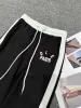 2024 Kadın Takipleri İlkbahar Yaz Moda Kısa Knapıtlı T-Shirt Yarım Etek Setleri Tasarımcı Kadın Moda Zarif İki Parçalı Set