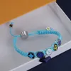 Bracelet à chaîne en corde de soie tissée à la main, fait à la main, créativité personnalisée européenne et américaine, émail coloré, bijoux de couple de créateur pour femmes, bracelet de dessin à breloques