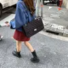 Les sacs de design de luxe sont bon marché à vendre Xiaoxiangfeng Sac à main pour femme en 2024 Sac à bandoulière simple en fil de broderie Oxford haut de gamme et de grande capacité