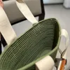 2024 TOTOTE Projektant torby 2024 Nowy wakacyjny w stylu wakacyjnym trawą tkanin moda duża pojemność plażowa wypoczynek handheld kapusta