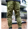 Pantaloni da uomo Pantaloni da corsa da notte da uomo Pantaloni sportivi Tasche laterali Cargo Harem Pant Pantaloni da jogging Pantaloni Moda più recente 240308