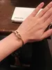 Bracelet en or Bracelets de créateur d'ongles pour femmes et hommes Xiao Zhans Même style Luxe léger personnalisé avec acier titane Bande de couleur non tombante Couple Ne logo