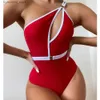 Kvinnors badkläder Vigocasey Hollow Out One Shoulder Badkläder Kvinnor 2024 Sexig One Piece Swimsuit Kvinnlig hög midja Monokini Solid Belt Bathing Suit L240308