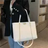 Lüks tasarım çantaları büyük kapasiteli dokulu elmas ızgara zinciri tote kadın çantası 2024 yeni çanta tek omuz moda satmak için ucuzdur