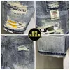 Jeans masculinos atacado 2021 moda coreana casual mendigo buraco denim shorts marca impresso remendo rasgado calças curtas