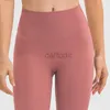 Pantalones activos Medias de talle alto Sin línea en T Fitness Yoga Pantalones de chándal con sentido desnudo Leggings elásticos para mujer Pantalones deportivos de color sólido con bolsillo en la cintura 240308