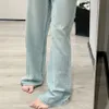 Dżinsy projektanta damskiego wysokiej pasy chude dżinsy z białym listerem listu i dżinsowymi spodniami o prostej długości