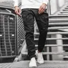 Pantaloni da jogging da uomo Pantaloni sportivi cargo solidi Pantaloni multitasche Abbigliamento sportivo Pantaloni a matita Harem 240308