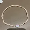 Lady Designer Pearl Necklaces Colored Enamel Buckle Saturn Pendant Necklace Sweet Cool Niche Collarbone Chain