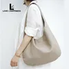 2023 Autumn/Winter leather women's shoulder bag Underarm bag Lazy casual soft cowhide shopping bag canvas double bread