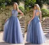 Hollow Ocean Blue Backless Prom kleedt een lijn pure juweel nek tule lange avondjurken met appliques cps3039 yd ppliques