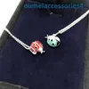 2024 Smyckesdesignermärke halsband S925 Sterling Silver Womens Blue Red Seven Star Ladybug Fashion Versatile Personalized Insect Pendant