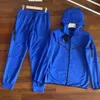 تقنيات Fleece Hoodies الأزياء مصممة سميكة للرجال رجال امرأة سراويل الرجال الرياضة zip jogger pant tracksuits womens joggers coats 606 578