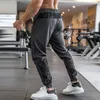 Alta qualidade camuflagem sweatpants homens ginásio de fitness calças esportivas correndo trackpants elástico seco ajuste zíper bolsos calças compridas 240304