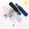 Paraplu's Kleine frisse drievoudige zwarte rubberen paraplu Zonnebrandcrème UV-bescherming Vrouwelijke persoonlijkheid Creatieve zonnescherm