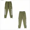 Pantalon Pantalon de survêtement de créateur vert pantalon cargo étoile rempli de jogger de rue haute lettre cargos polaire technique surdimensionné Encre colorée Sports pompon à séchage rapide 240308