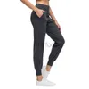 Pantalon actif Lulu Pant Yoga taille haute femmes pantalons de survêtement pantalons de survêtement de course pantalons de jogging coniques d'entraînement pour Yoga Lounge Gym Leggins avec poche 240308