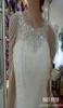 2019 Lussuosi gioielli con strass di cristallo Abiti da sposa Abiti da sposa in pizzo bianco con scialle Giacca Bolero Abito da sposa con perline4457367