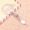 Keychains 20st Fashion Keychain 27x10mm Devil Mirror Pendants Diy Men smycken bil nyckelkedja ringhållare souvenir för gåva