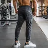 Alta qualidade camuflagem sweatpants homens ginásio de fitness calças esportivas correndo trackpants elástico seco ajuste zíper bolsos calças compridas 240304