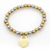 T Famille en acier inoxydable Décoration de la main Peach Heart Bracelet Perle Round Perle femme Titanium Steel Jewelry2024
