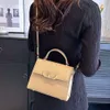 Marca tridimensional portátil de moda pequeño cuadrado con estampado de palma de cuero de vaca bolso de mujer de cuello blanco nicho bolsos de un hombro bolso cruzado