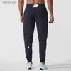 Lululemen Lulu para hombre Traje de yoga corto Jogger Sport Quick Dry Cordón Gimnasio Bolsillos Pantalón deportivo Pantalones Cintura elástica 240308