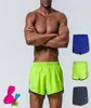 Sportsmän som kör shorts andningsbar snabb torr svart grå fitness gym kort homme stor storlek6917129