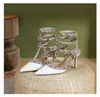 리벳 포장 된 하이힐 여름 유럽과 미국 섹시한 liuding 얇은 힐 스트랩 샌들 여성 디자이너를위한 웨딩 신발