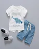 04 år högkvalitativ pojke tjejkläder set sommartecknad casual barn kostym barn baby tshirtpant 2st 2106158402467