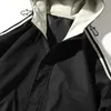 2023 Jesienna moda na zewnątrz kurtki sportowe męskie paski wiatrówki męskie płaszcz z kapturem z kapturem z kapturem kurtka odzieży wierzcha Sportswea 240223