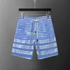 Geruite nieuwe herenshorts, heren designershorts, heren- en dameskledingmerken luxe losse mode casual shorts, strandbroeken geruite kleding 02