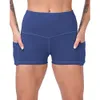 Pantalons yoga avec poches Nouveau pantalon de yoga à poche fendue serrée miel pêche hanche fitness taille haute short de yoga pour femmes pantalons de sport pour femmes de créateur UH8Q
