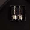 DFDF 2024 Dernières boucles d'oreilles longues à pampilles avec lettre de diamant d'eau avec sens avancé léger luxe style occidental à la mode rétro haut de gamme femmes