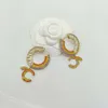 2023 Boucle d'oreille de charme de qualité de luxe avec un design de forme ronde en diamant de couleur blanche et rouge avec tampon de boîte PS7501A323Z