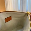 Borsa a mano di design per uomo e donna Borsa a mano con toppa in pelle di mucca goffrata in tela stampata alla moda Borsa a mano di lusso retrò con cerniera popolare Portafoglio di alta qualità