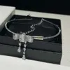 Collier de créateur Miuimiui Le collier à pampilles en diamant clouté avec nœud de la famille Miaos m est à la mode, léger et luxueux avec un sentiment de luxe et d'élégance, le collier est un