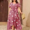 Robes sexy urbaines à pois simple robe de grande taille mode taille élastique impression tempérament jupe femmes col en V cravate taille longueur de plancher jupe 4XL L240309