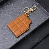 Fashion Black Brown Chocolate Bar Keychains delicious chocolate Leather metal pendant key ring classics Monogram charm Car keychain Men Women louise vutton viuton