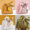 Envoltura de regalo 20 unids Bolsas de regalo de cuero de boda con cinta de arco Bolsa de embalaje Favor de Pascua Bolsas de distribuciones Eid Mubarak Candy Mini bolso T240309