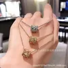 Colar de pingente de designer Doce VanCA trevo de quatro folhas caleidoscópio de diamante para mulheres 18K ouro rosa pequena cintura bárbara clavícula corrente malha de ouro vermelho R6JA