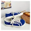 Chaussures décontractées Designer toile femmes baskets basses bout large à lacets baskets marque filles rouge bleu Tenis Plimsolls