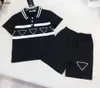 Popular Baby Tracksuits T-shirt Conjunto de camisetas infantis roupas de grife de designer 90-150 cm conjunto de duas peças de duas peças de camisa pólo geométrica e shorts de renda 24mar