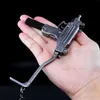 Gun Toys Legierung 1/3 Miniatur UZI Modell Maschinenpistole 15 cm Hochwertige Pistole Schlüsselanhänger Handwerk Anhänger Fake Gun Waffe Geburtstagsgeschenke T240309