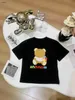 Luxo crianças t-shirt boneca urso padrão bebê tshirt tamanho 100-150 cm designer roupas de bebê verão preto branco meninos meninas manga curta tees 24mar