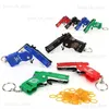 Gun Toys 1PC MINI Toy Gun Keychain 50 Rubber Bands Folding Rubber Band Gun Shooting Pistol Alloy Key Charm Pendant Kid Outdoor Party Gift T240309