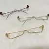 Neue Mode Brillen Legierung Rahmen für Frauen grün und rot Edelstein linsenlose Kette Anhänger Halbrahmen Luxus Diamant Brille T2001082668